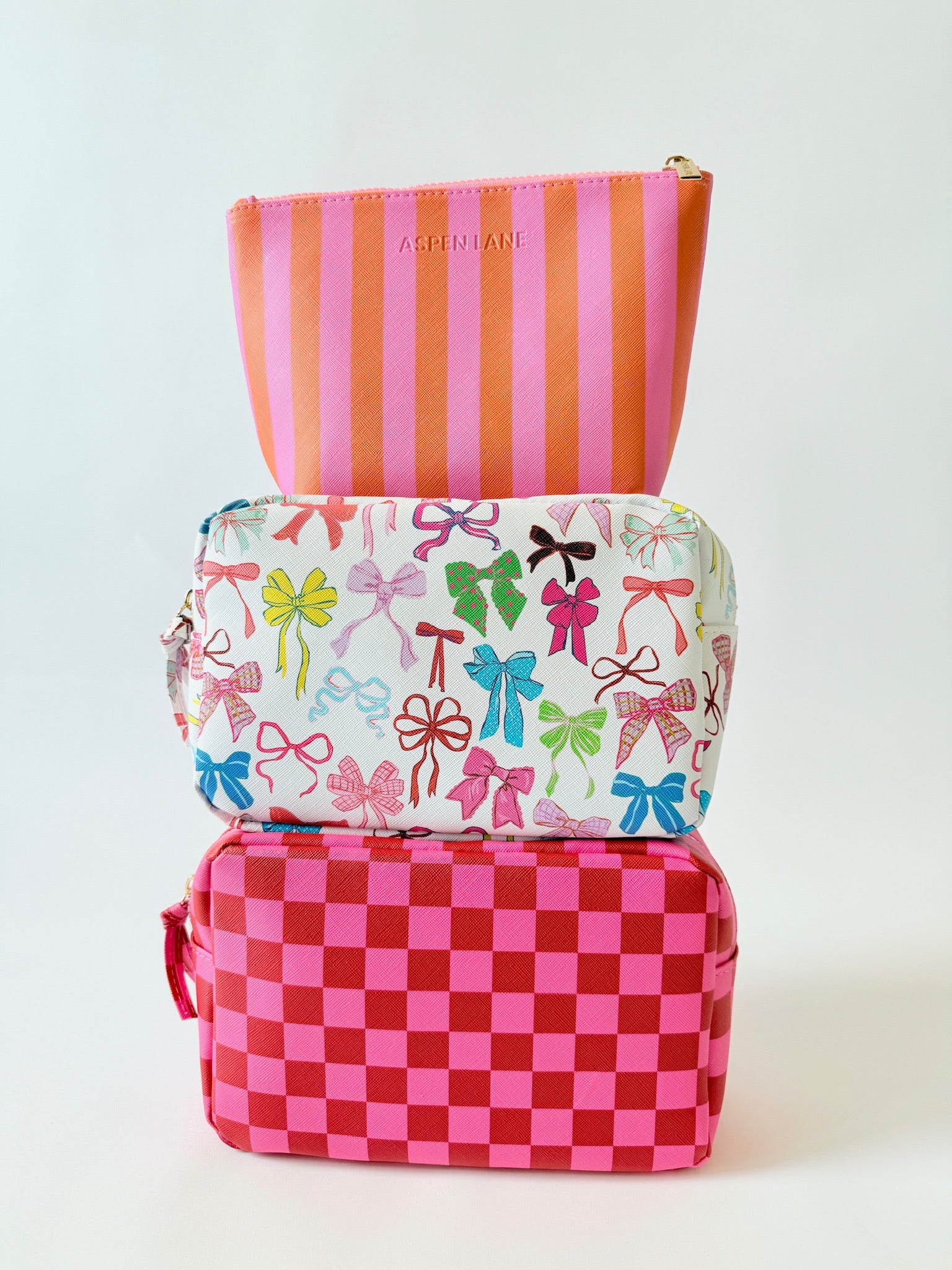 Striped Saffiano Vegan Leather Pouch (Pink & Orange) | Bulk Wholesale Name Drop