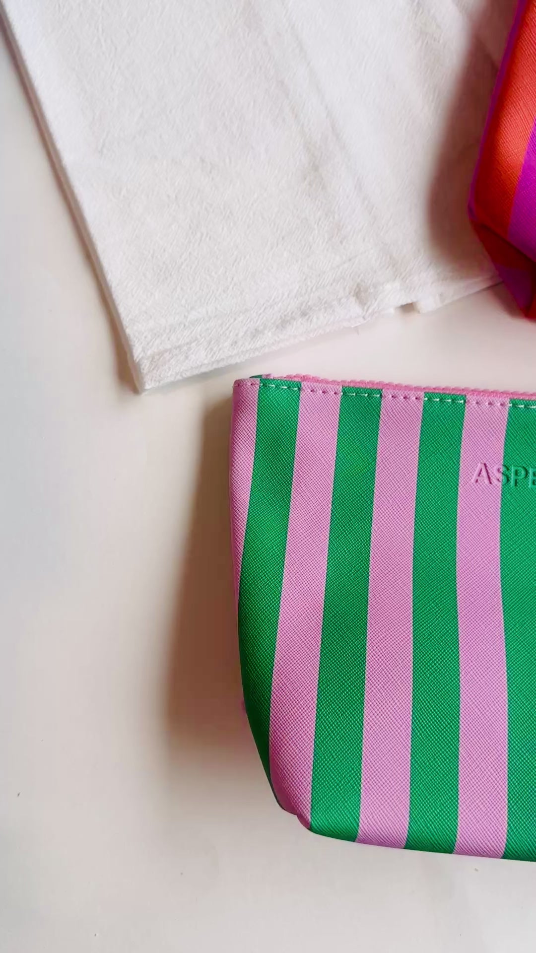 Striped Saffiano Vegan Leather Pouch (Pink & Orange) | Bulk Wholesale Name Drop
